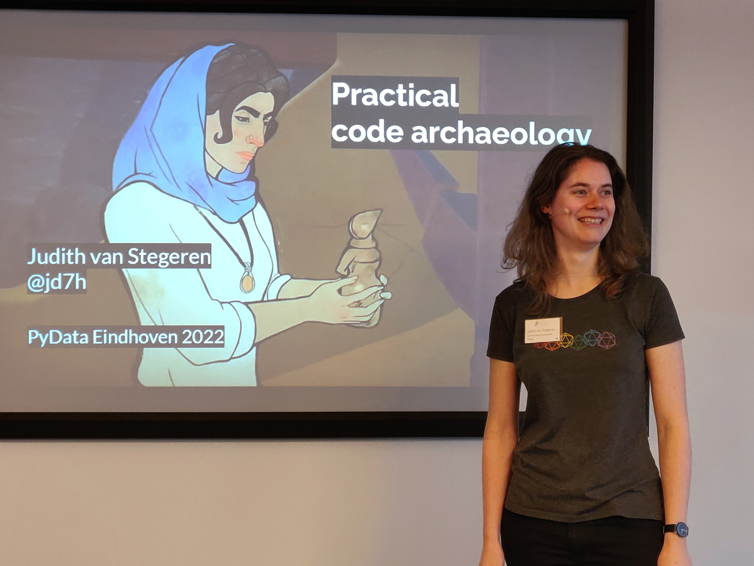 Judith van Stegeren talking about code archaeology at PyData Eindhoven 2022